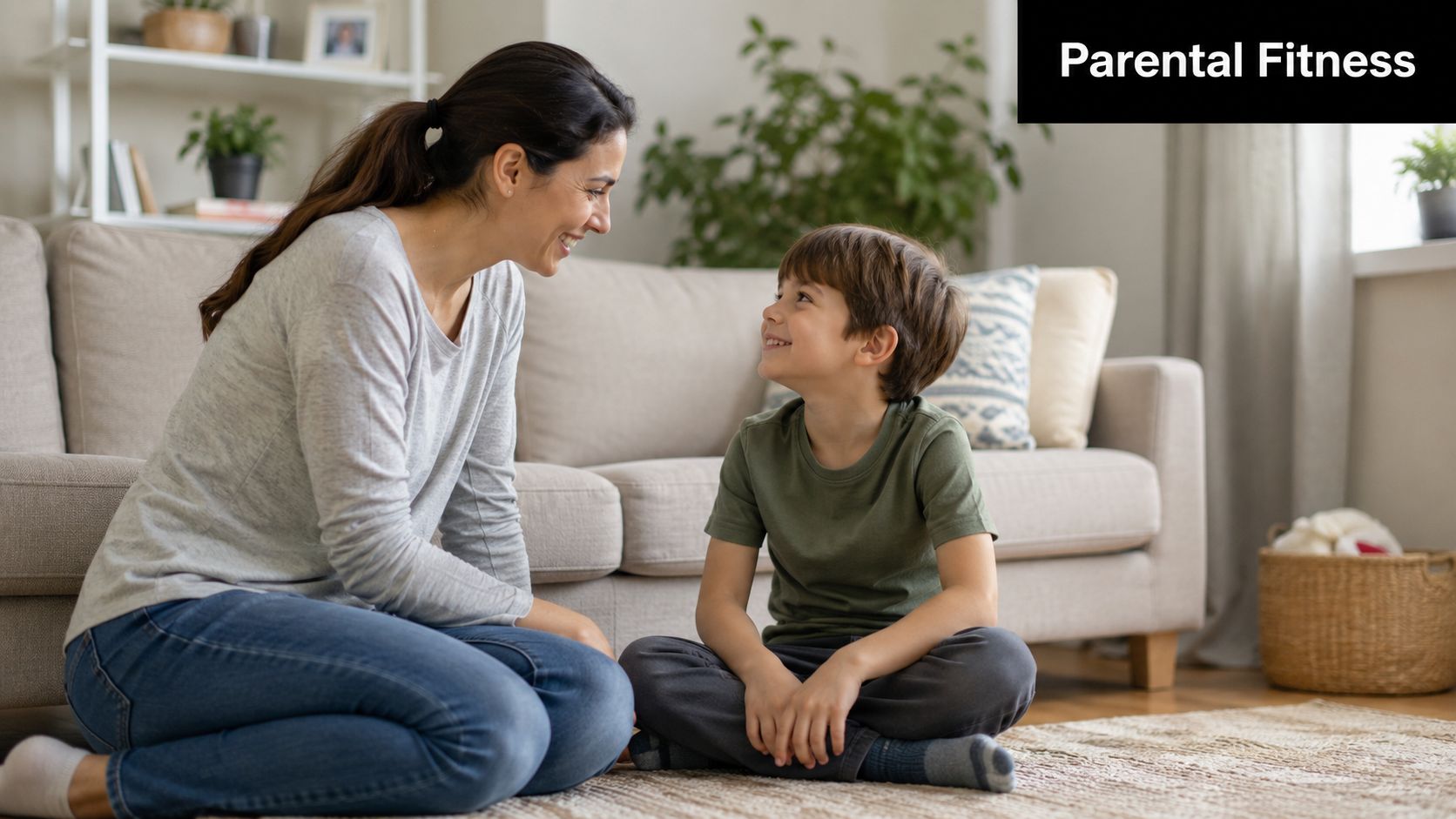 A smiling mother and her young son sitting together on a living room carpet floor