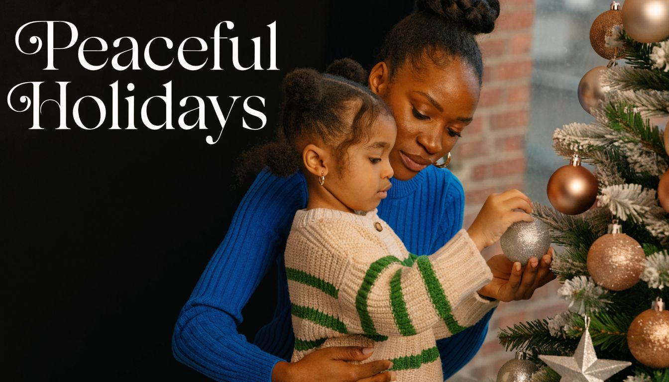 A mother and her daughter decorating a Christmas tree together in a peaceful holiday setting.