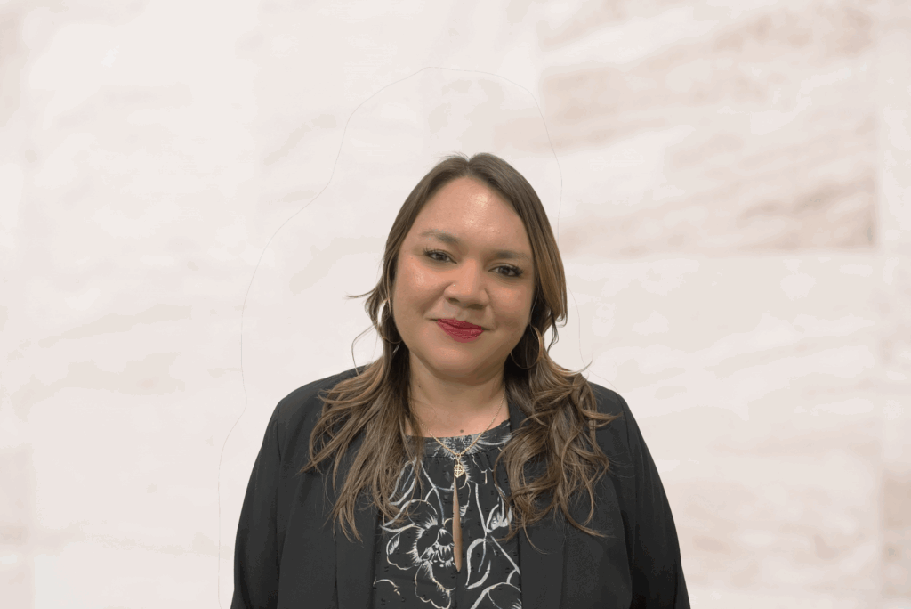 Catherine Estrada, family law attorney at Law Office of Bryan Fagan, smiling in professional attire against a neutral background.