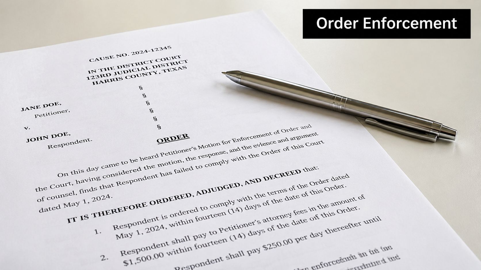 A legal document labeled Order Enforcement lying on a desk next to a silver pen.