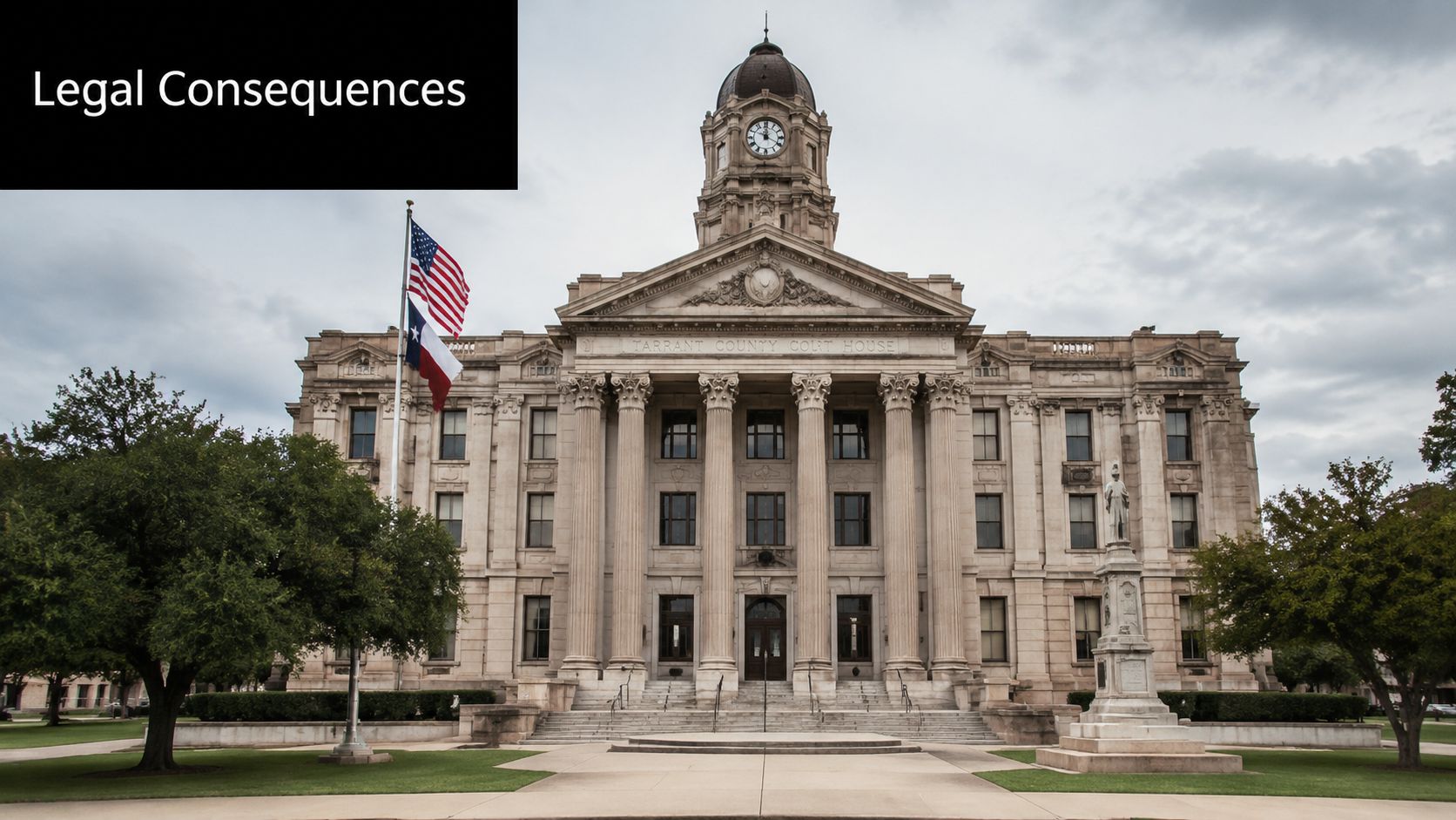 The historic Tarrant County Courthouse building under a cloudy sky with Texas and United States flags.